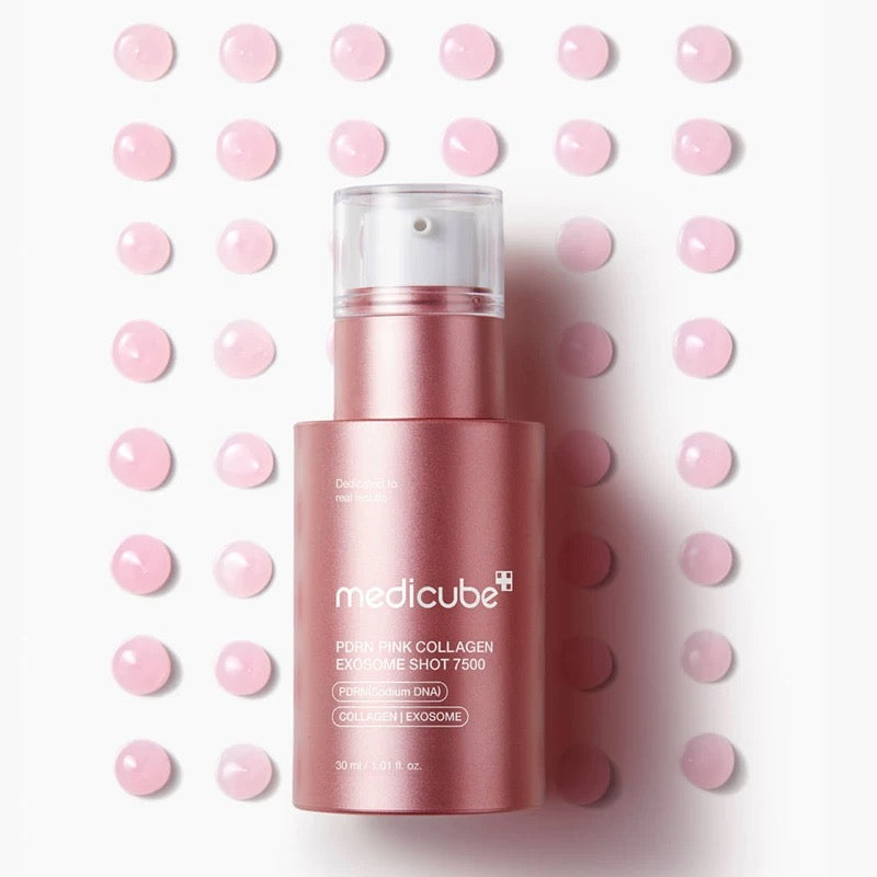 Pink skincare bottle with 'medicube' branding on a white background with pink dots.