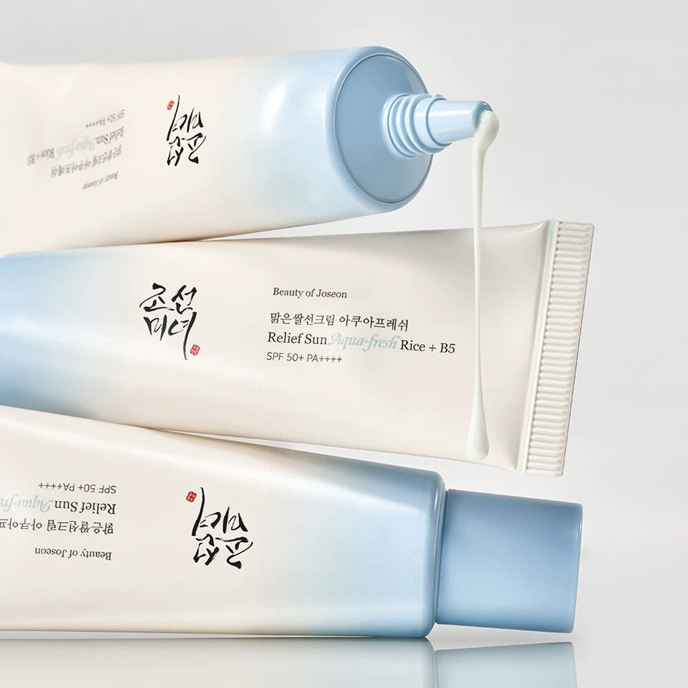 Three tubes of Beauty of Joseon Relief Sun: Aqua-Fresh Rice + B5 50ml on a light gray background