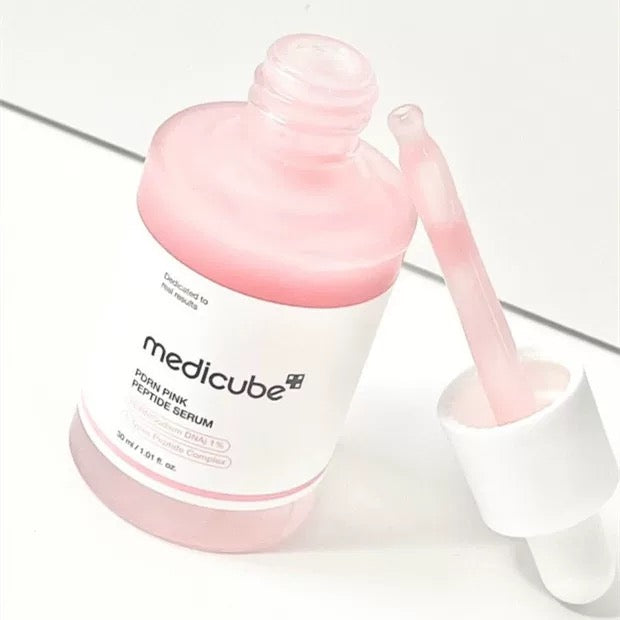 Medicube PDRN Pink Peptide Serum 30ml with dropper on a light background