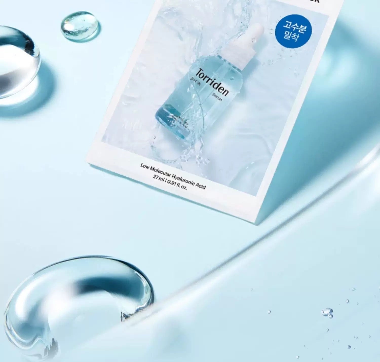 Torriden DIVE IN Hyaluronic Acid Mask with packaging on a blue background