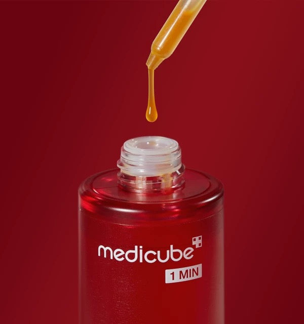 Medicube Red Acne Succinic Acid Peel Wash Off Peeling Serum 40G dropper on a red background