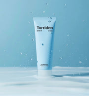 Torriden DIVE-IN Cream 80ml on blue background with water droplets